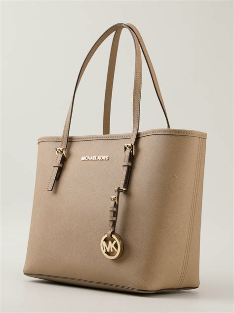 michael kors jet set tote straps|michael kors jet set luggage.